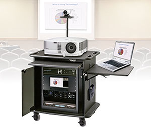 The Mobile HD Webcaster cart set up at the front of a lecture room, with projector, camera, confidence monitor and a rack of gear
